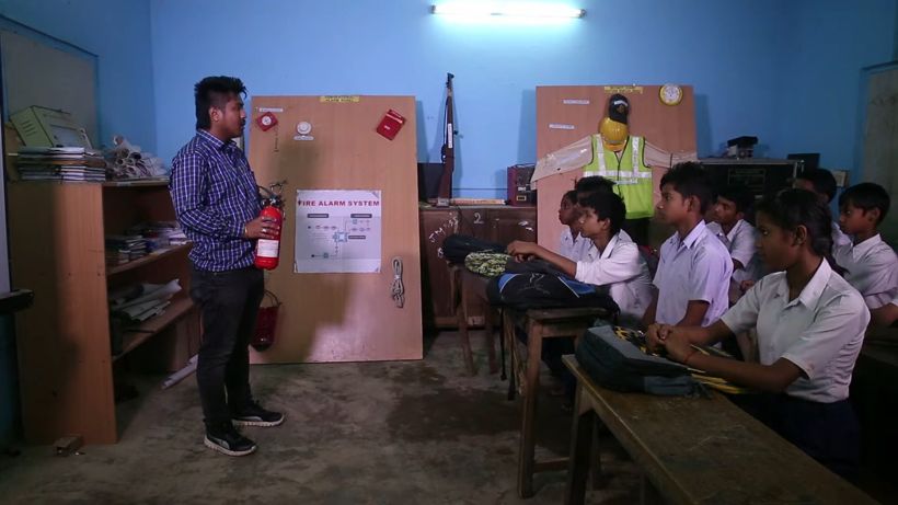 A teacher and students in a classroom