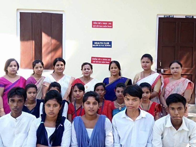 Teachers and students gathered outside the Health Club room