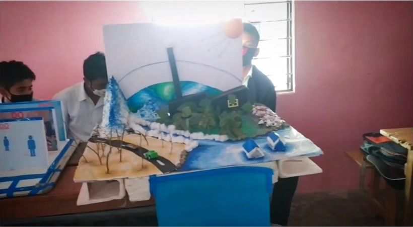 A student-built model of a landscape with a river