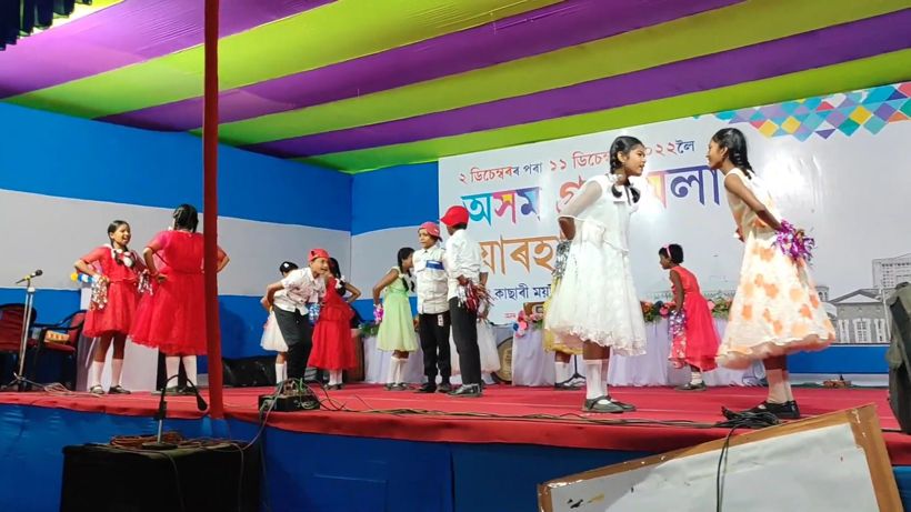Young girls in party dresses dancing